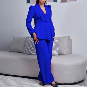 Detail of royal blue V-neck long sleeve top and high waist wide leg pants set