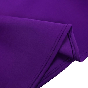 Close-up of deep purple fabric texture with high-quality double-needle stitching detail