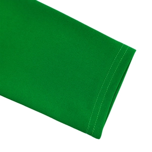 Detail of double-stitched cuff on a green long-sleeved dress with high-density fabric texture