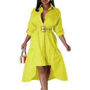 Macro view of bright yellow shirt dress highlighting unique high-low hem and button details