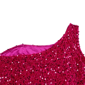Close-up of sparkling rose red sequins on an elegant one-shoulder evening gown dress