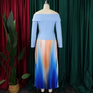 Detail view of women's off-shoulder blue top and gradient pleated long skirt set