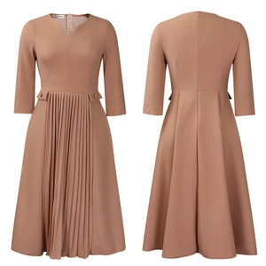 Detail view of camel V-neck pleated dress with three-quarter sleeves and buttoned waist