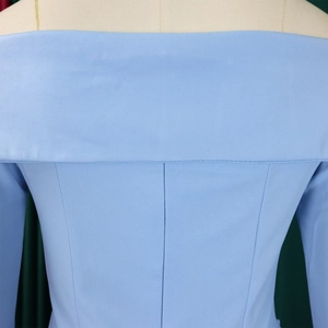 Detail of off-the-shoulder light blue dress featuring premium woven fabric and back stitching