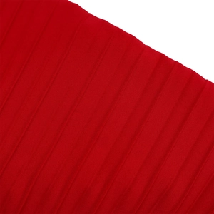 Macro shot of high-saturation red pleated fabric texture with vertical striped ribbing