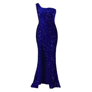 Detail showing high-slit cut and sparkling royal blue sequins on evening gown