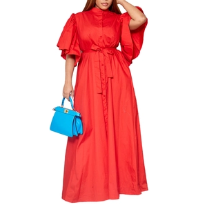 Detail of red maxi dress featuring flare sleeves, button-down front and waist tie belt