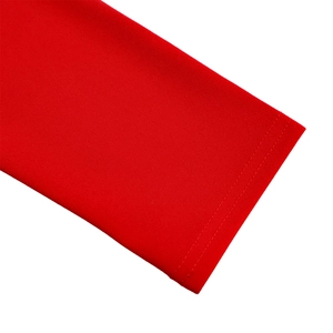 Close-up of high-quality double-needle stitching on red knit fabric hemline