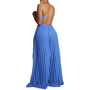Detail view of backless navy pleated jumpsuit with gold metal chain neck strap