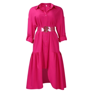 Detail of rose pink shirt dress with high-low ruffle hem and transparent PVC belt