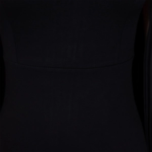 Detailed close-up showing the waist stitching and pleated texture of the black evening dress