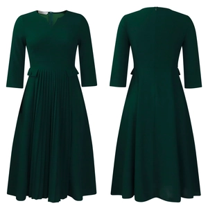 Detail view of dark green pleated dress with V-neck and three-quarter sleeves