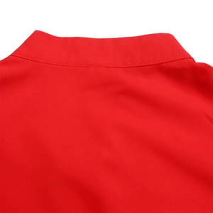 Close-up of red flare sleeve dress showing fabric texture and neat double-stitching