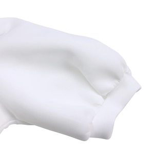 Detailed macro view of high-quality white ribbed cuffs on a short sleeve dress