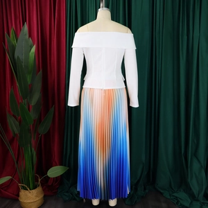 Detail of off-shoulder top and blue-orange gradient pleated maxi skirt set