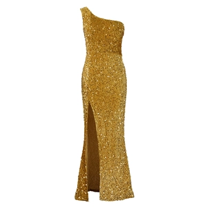 Detailed view of shimmering gold sequins and high side slit on an elegant evening gown