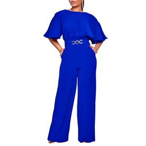 Detail of royal blue wide-leg jumpsuit with silver metal ring waist decoration