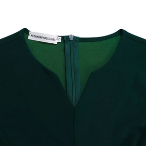 Detail of V-neck notch and concealed zipper on dark green pleated dress