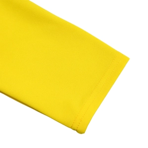 Detail of high waist yellow dress showing double-needle stitching and fabric texture