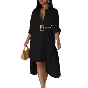 Detail of black shirt dress with lapel, silver buckle belt and irregular layered hemline