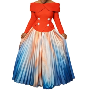 Detail of red off-shoulder top with floral pearl buttons and ombre pleated maxi skirt
