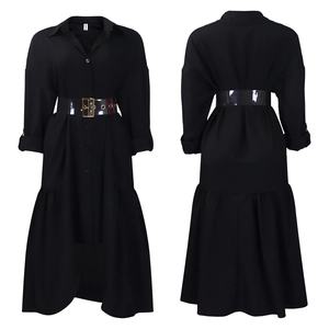Detail of black shirt dress featuring a wide transparent PVC belt and pleated skirt design