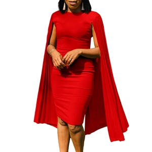 Detail of the elegant red dress featuring pleated cape sleeves and a slim-fit round neck design