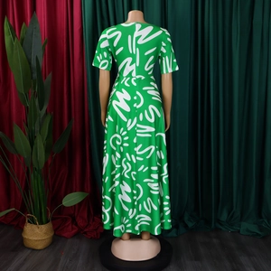 Detailed back view of green African print maxi dress with invisible zipper and short sleeves