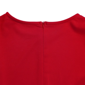 Close-up of smooth red fabric featuring a neat round neckline and invisible back zipper