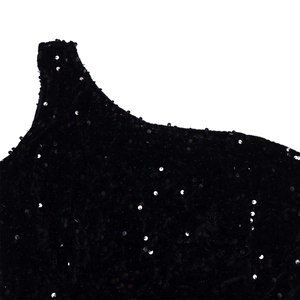 Detail view of shimmering black sequins on the shoulder of this elegant evening dress