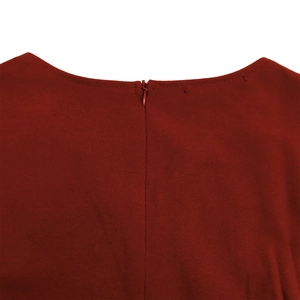 Detail of the back neckline featuring a matching invisible zipper on wine red fabric