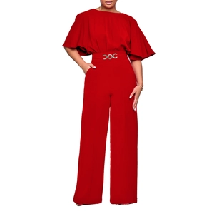 Detail of red two-piece suit with bell sleeves, high-waist pants and ring belt buckle