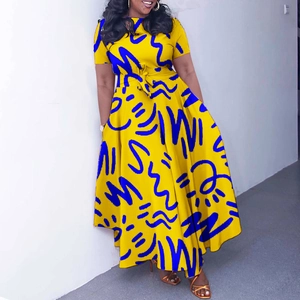Detailed view of yellow African print dress with waist tie and abstract blue texture