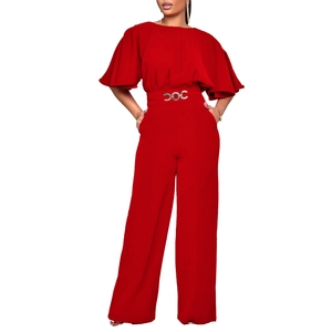 Detail of red wide-leg jumpsuit with ruffled sleeves and silver metal ring waist belt