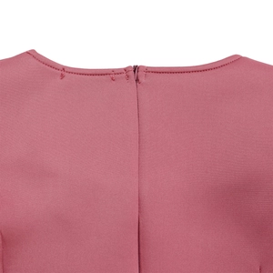 Detailed back view of a pink ruffle dress featuring a concealed zipper and clean neckline
