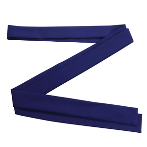 Detailed view of dark blue fabric belt accessory with refined texture and matte finish