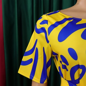 Detail of yellow and blue African print short sleeves on a summer maxi dress