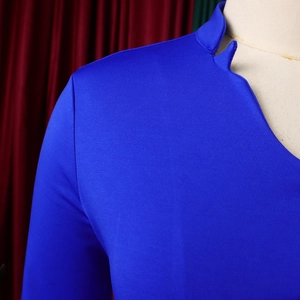 Detail of royal blue v-neckline and textured knit fabric on flare sleeve top set