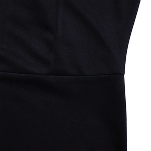 Detailed close-up of high-quality sewing and stitching on dark navy evening gown fabric