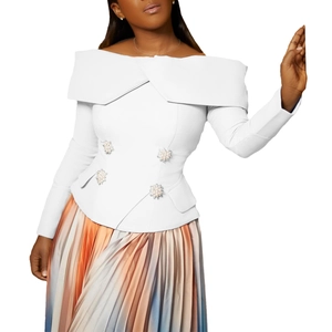 Detail of off-shoulder shirt with star pearl buttons and gradient pleated skirt