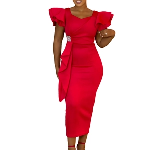 Detail of red ruffle sleeves and waist rhinestone accent on an elegant midi dress
