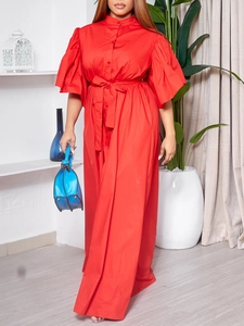 Elegant red long dress featuring flare sleeves and a waist belt for a chic summer look