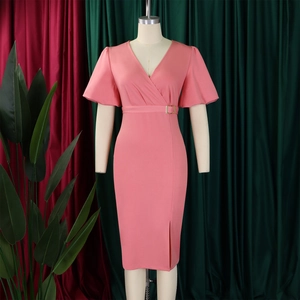 Pink V-neck dress detail featuring ruffled sleeves and a gold buckle belt on a mannequin