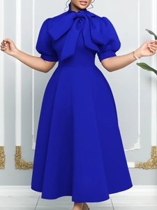 Royal blue puff sleeve evening dress with a large bow neckline and A-line silhouette