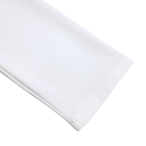 Macro shot of pure white knit fabric texture with precision single-needle stitching hem