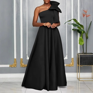 Elegant one-shoulder black evening gown featuring a large decorative bow and A-line skirt