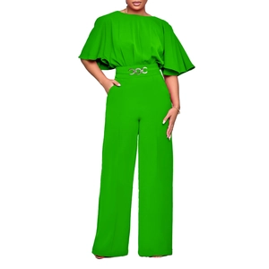 Detail of lime green ruffle sleeve jumpsuit with high waist and silver chain buckle