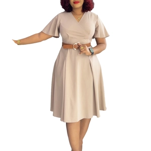 Detail of V-neck summer dress with butterfly sleeves and a stylish brown leather belt