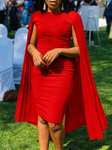 Elegant red cape-style fitted evening dress with pleated shawl sleeves and crew neck