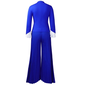 Detail of royal blue fashion set showing flared sleeves with white pleated trim and wide pants